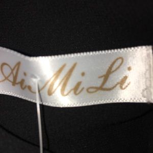 Ain MiLi Tops - ๐ฅHP๐ฅ NWT Beautiful black Top Ain MiLi Tops - ๐ฅHP๐ฅ NWT Beautiful black Top
